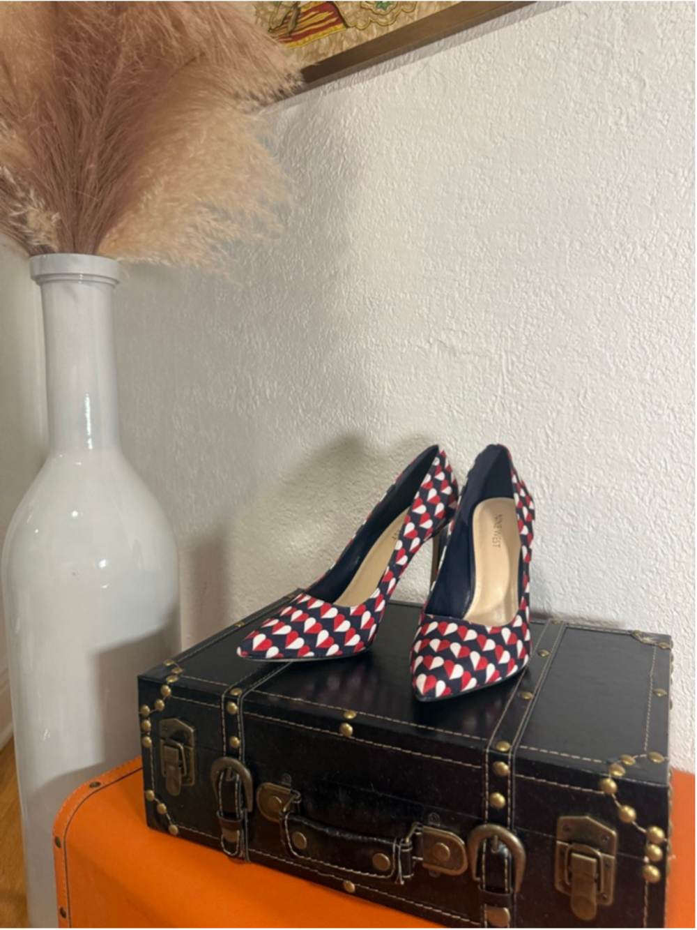 Preowned, Woman’s Nine West pointed toe pumps, red/blue/white, size 9